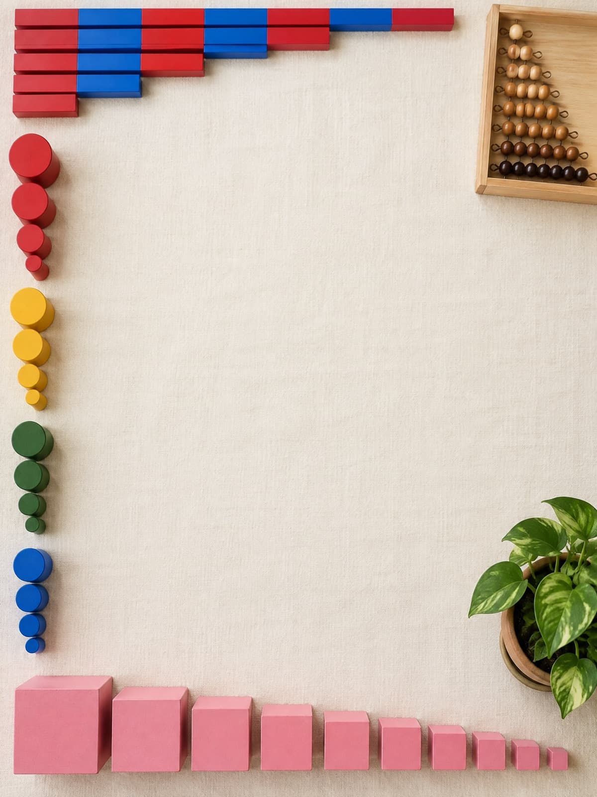 Montessori number rods, knobless cylinders, a bead stair and a pink tower arranged around the edge of a linen mat