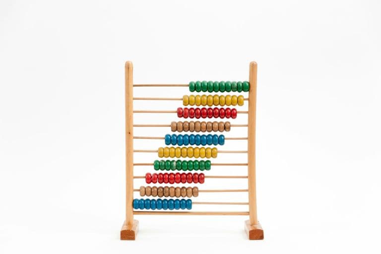 A wooden abacus with rows of coloured counting beads